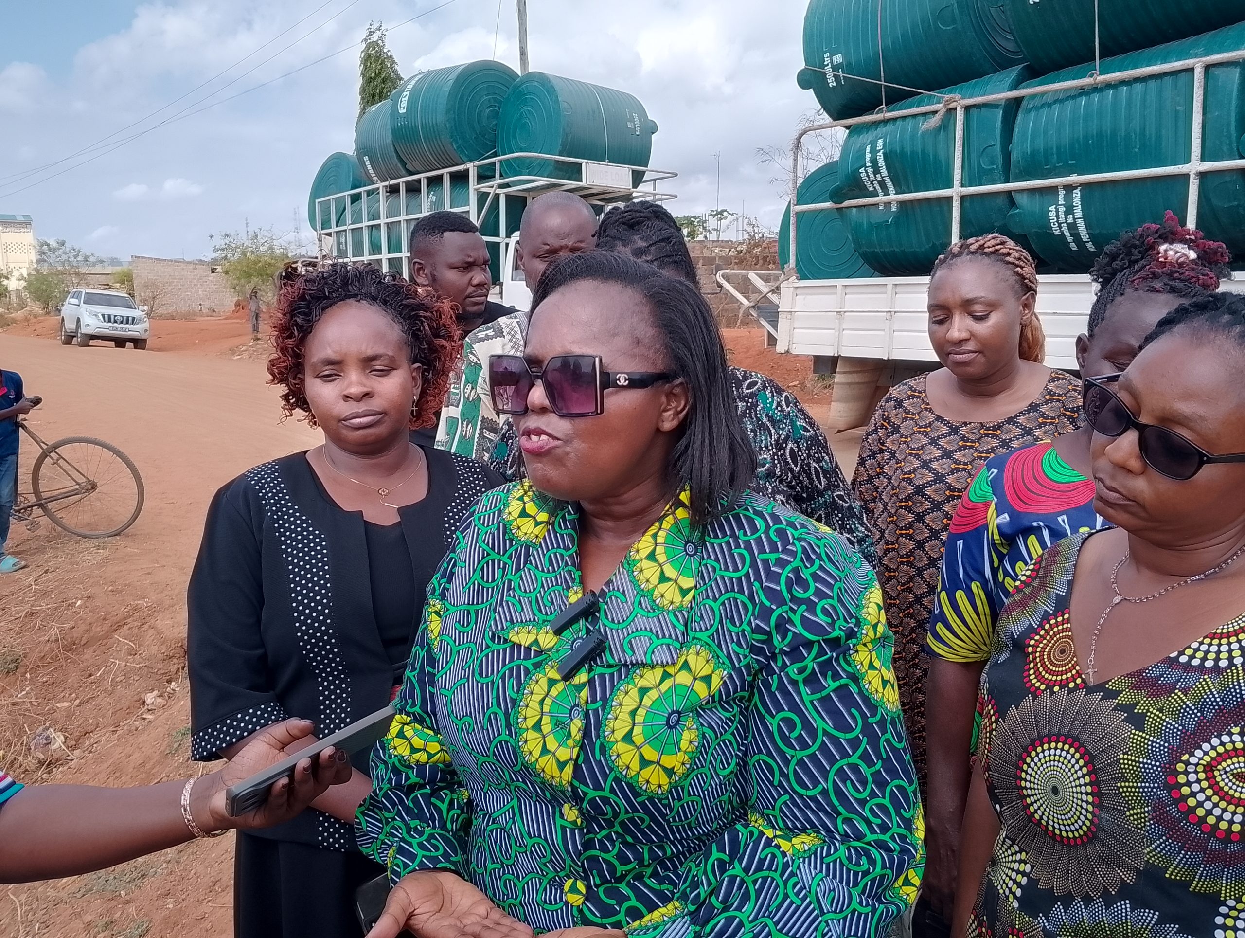 Former Minister Peninah Malonza Distributes 32 Water Tanks in kamutei, Ikutha, Urges Kitui Residents to Harvest Rainwater and Register as Voters